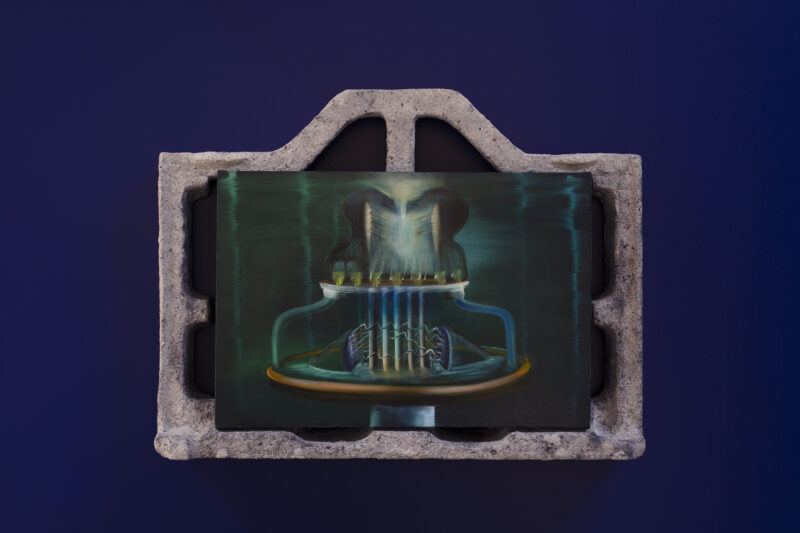 An abstract circuit-like painting, placed within a concrete block, set against a dark blue background.