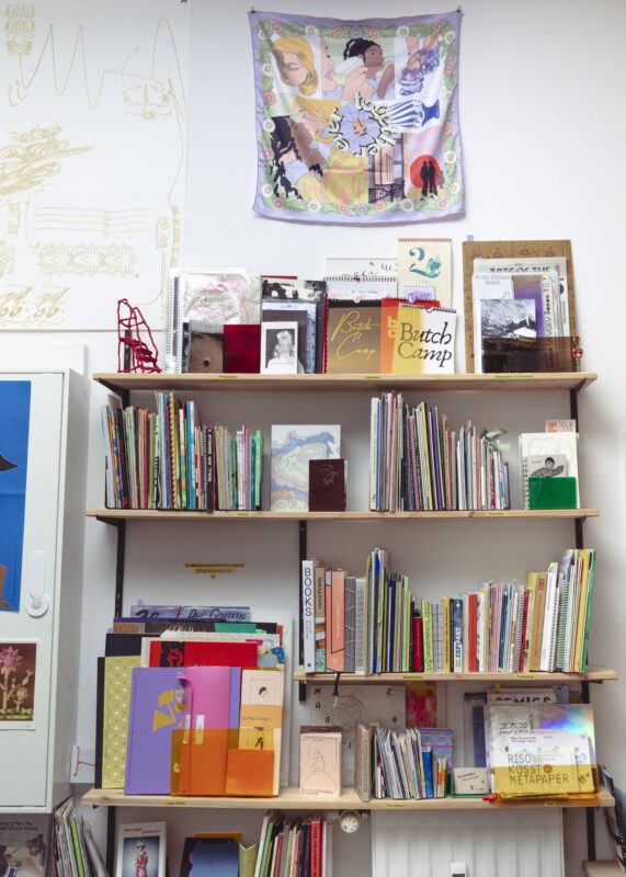 Full bookhelves in Colorama's project space.